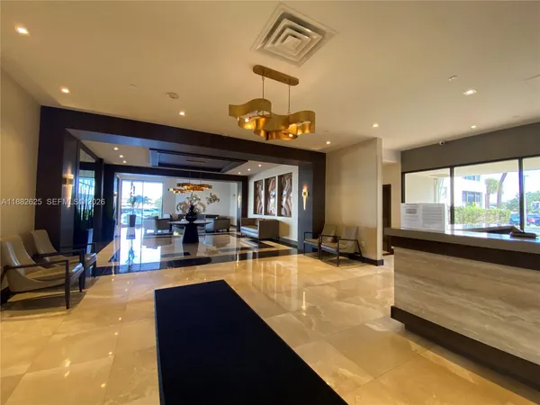 a view of a living room with gym equipment