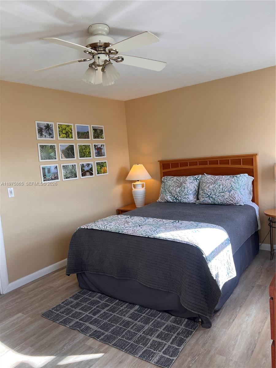 2600 North Surf Road, Unit 403 Hollywood, FL 33019 - Photo 13 of 24 a bedroom with a bed and window