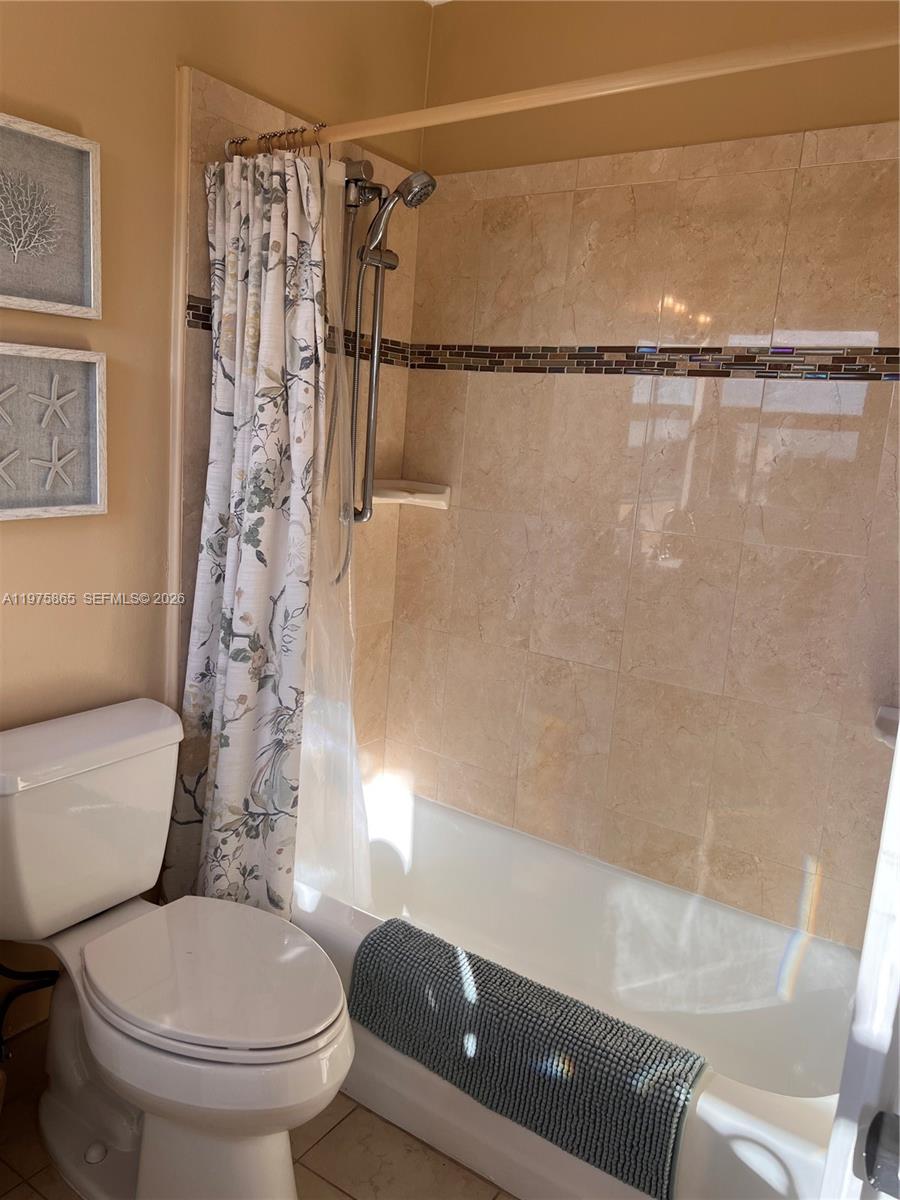 2600 North Surf Road, Unit 403 Hollywood, FL 33019 - Photo 18 of 24 a bathroom with a toilet and a shower