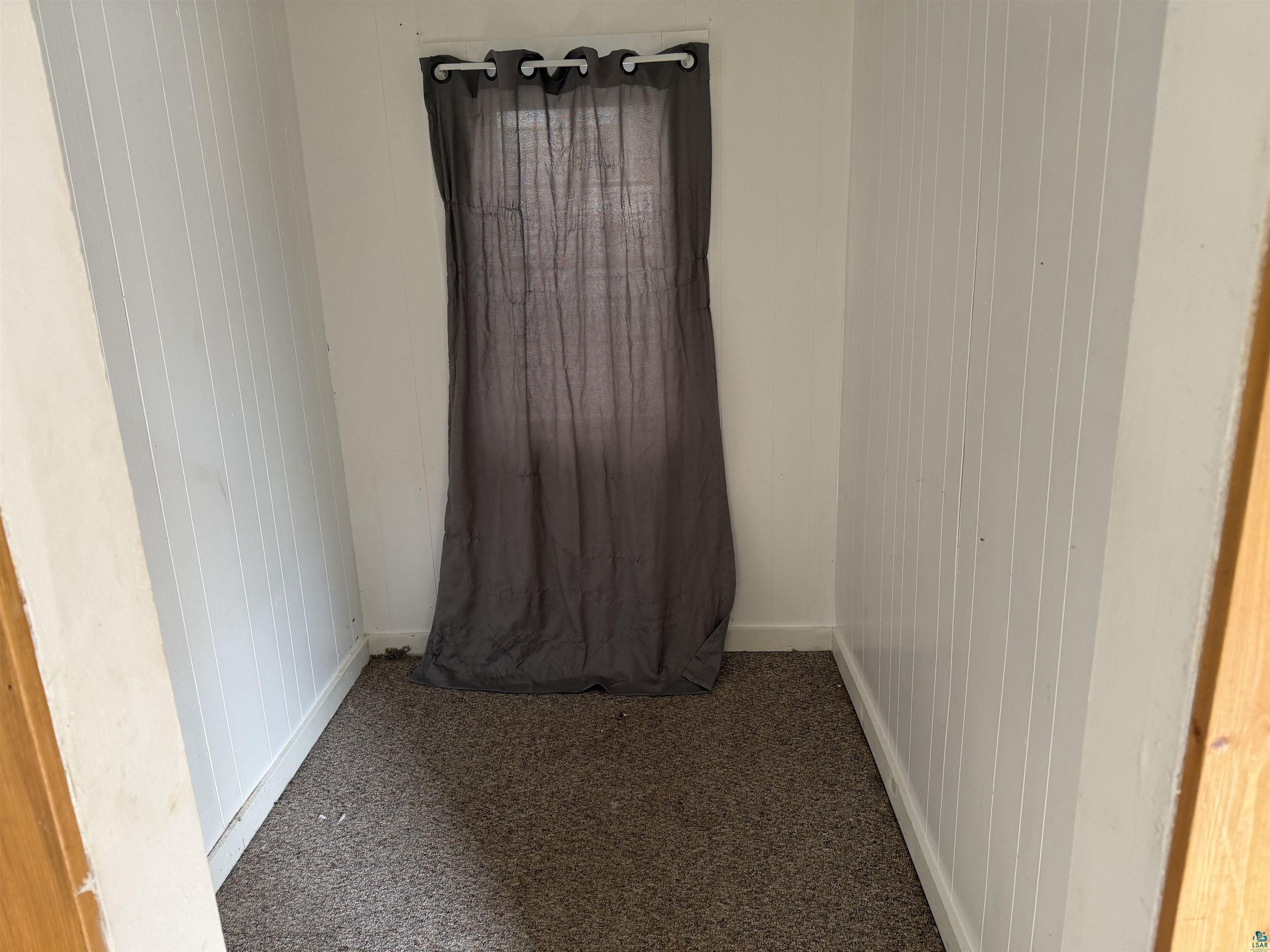 1720 Iowa Avenue Superior, WI 54880 - Photo 8 of 11 Carpeted empty room featuring baseboards