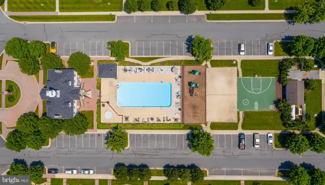 an aerial view of residential house with outdoor space and street view