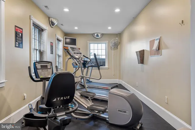 an aerial view of residential building and lake