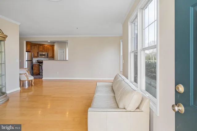 a view of livingroom with furniture and window