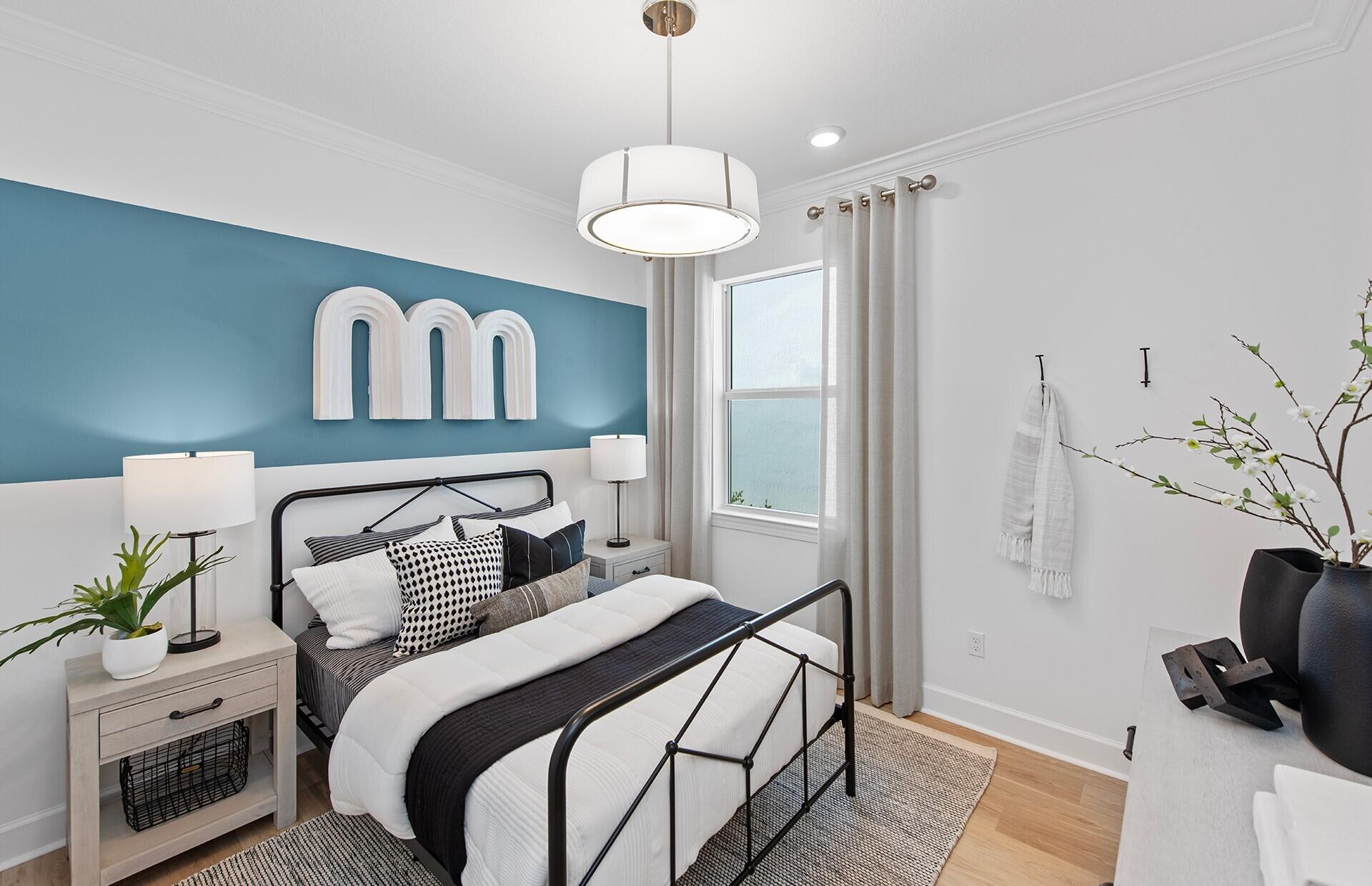 10391 Southwest Highpointe Drive, Unit HIGHGATE 265 Stuart, FL 34997 - Photo 16 of 31 a bedroom with bed and a window