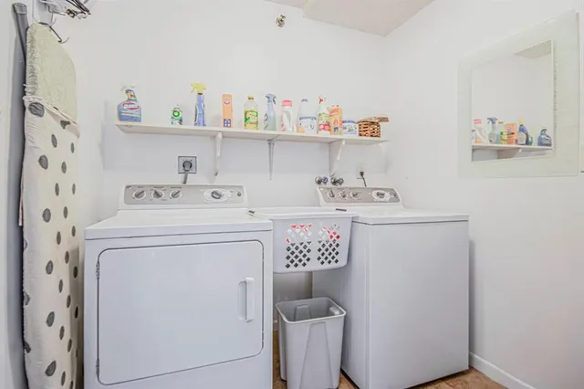 a utility room with dryer and washer