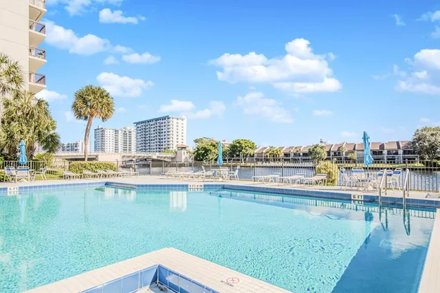 a view of a lake with a city view
