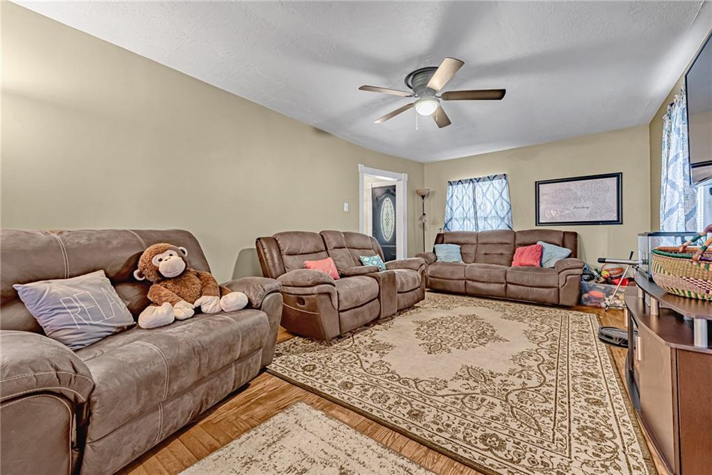 2096 Indian Head Road Normalville, PA 15469 - Photo 5 of 24 a bedroom with furniture and a chandelier