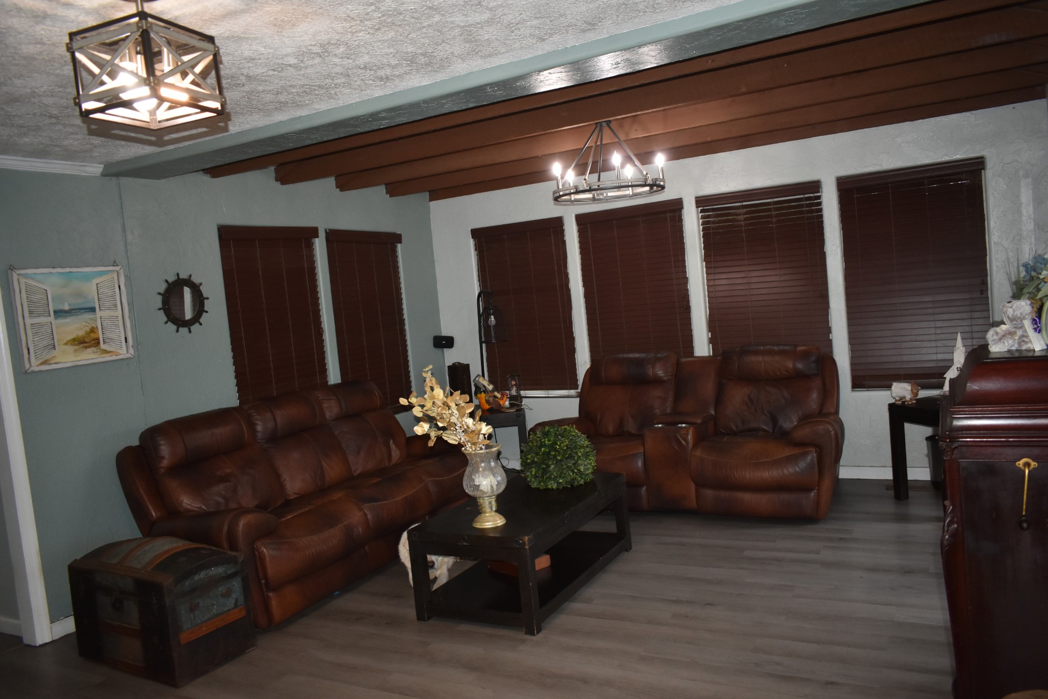 424 Wilderness Trail Road Granville, TN 38564 - Photo 6 of 16 a living room with furniture and a chandelier