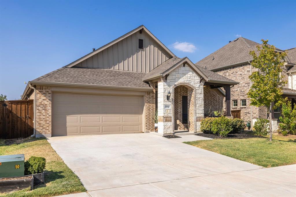 1732 Wassel Road Fort Worth, TX 76052 - Photo 2 of 39 a front view of a house with a garden