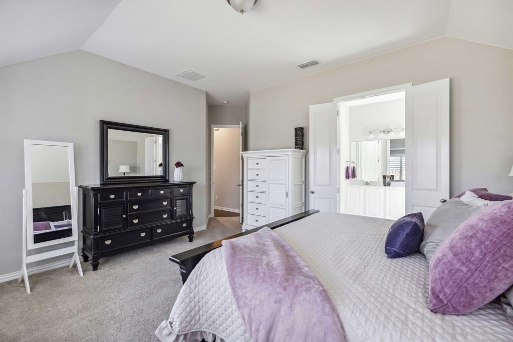 1732 Wassel Road Fort Worth, TX 76052 - Photo 24 of 39 a bedroom with a bed and a dresser