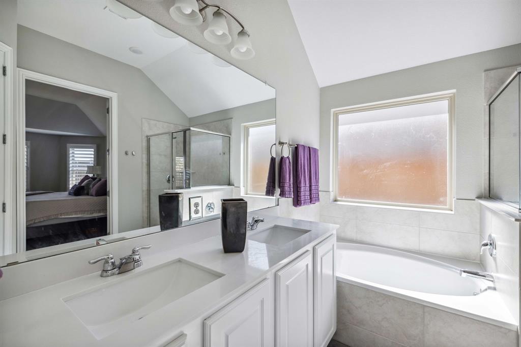 1732 Wassel Road Fort Worth, TX 76052 - Photo 25 of 39 a bathroom with a tub sink and mirror