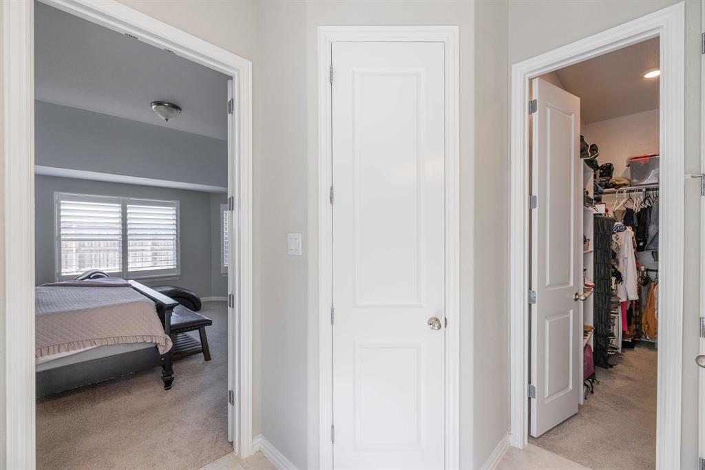 1732 Wassel Road Fort Worth, TX 76052 - Photo 28 of 39 a view of a bedroom with a bed and a window