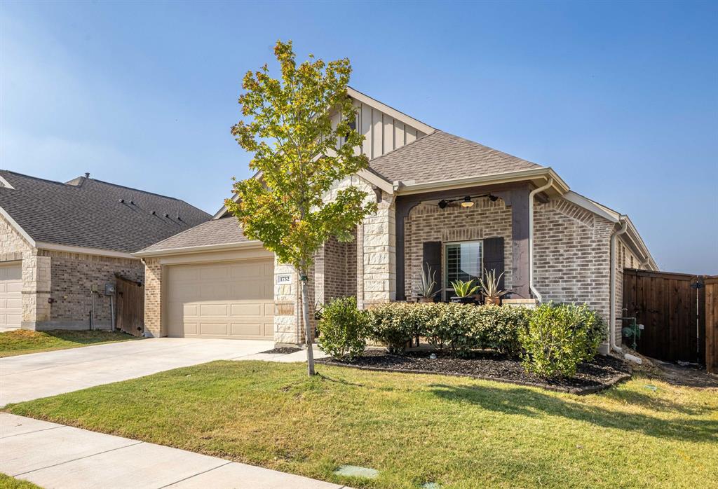 1732 Wassel Road Fort Worth, TX 76052 - Photo 3 of 39 a front view of a house with a yard