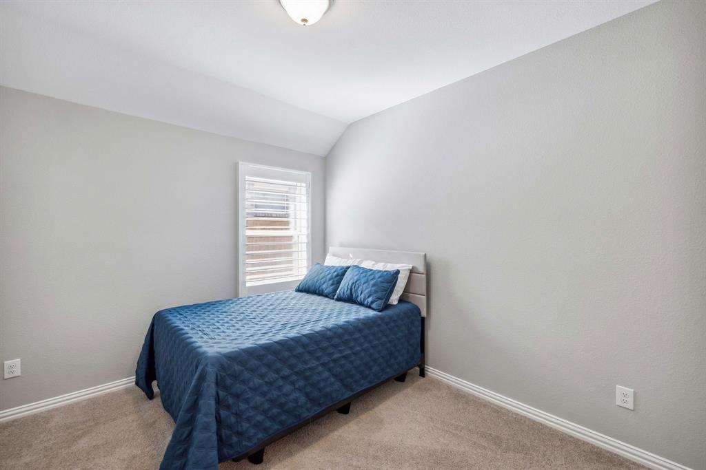 1732 Wassel Road Fort Worth, TX 76052 - Photo 32 of 39 a bedroom with a bed and window