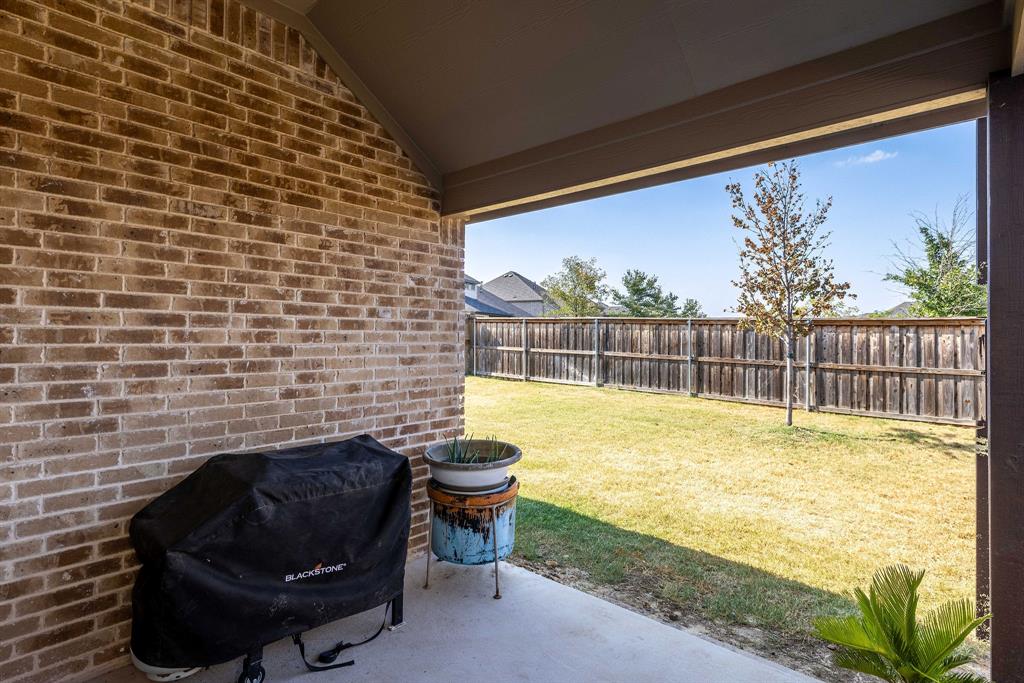 1732 Wassel Road Fort Worth, TX 76052 - Photo 34 of 39 a view of a swimming pool with a lounge chair
