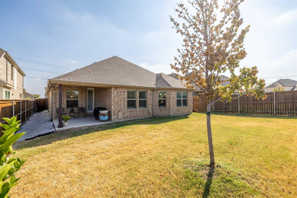 1732 Wassel Road Fort Worth, TX 76052 - Photo 37 of 39 a house view with swimming pool in front of it