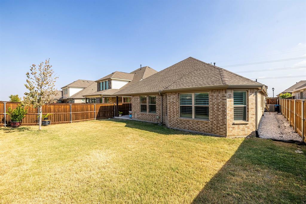 1732 Wassel Road Fort Worth, TX 76052 - Photo 39 of 39 a front view of house with yard outdoor seating and barbeque oven
