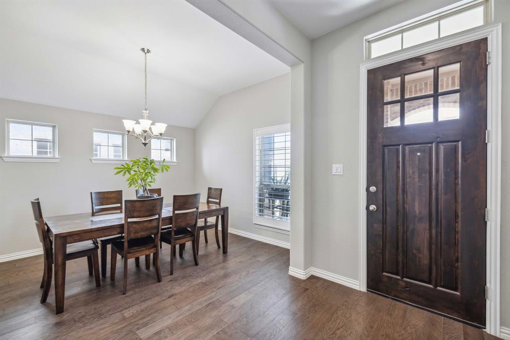 1732 Wassel Road Fort Worth, TX 76052 - Photo 6 of 39 a view of a dining room with furniture window and wooden floor