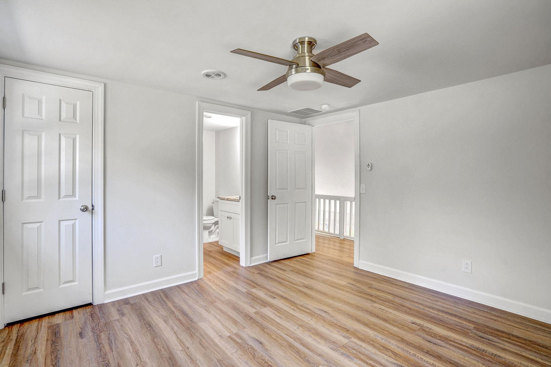 170 Temple Road Bunnlevel, NC 28323 - Photo 21 of 34 wooden floor in an empty room with a window