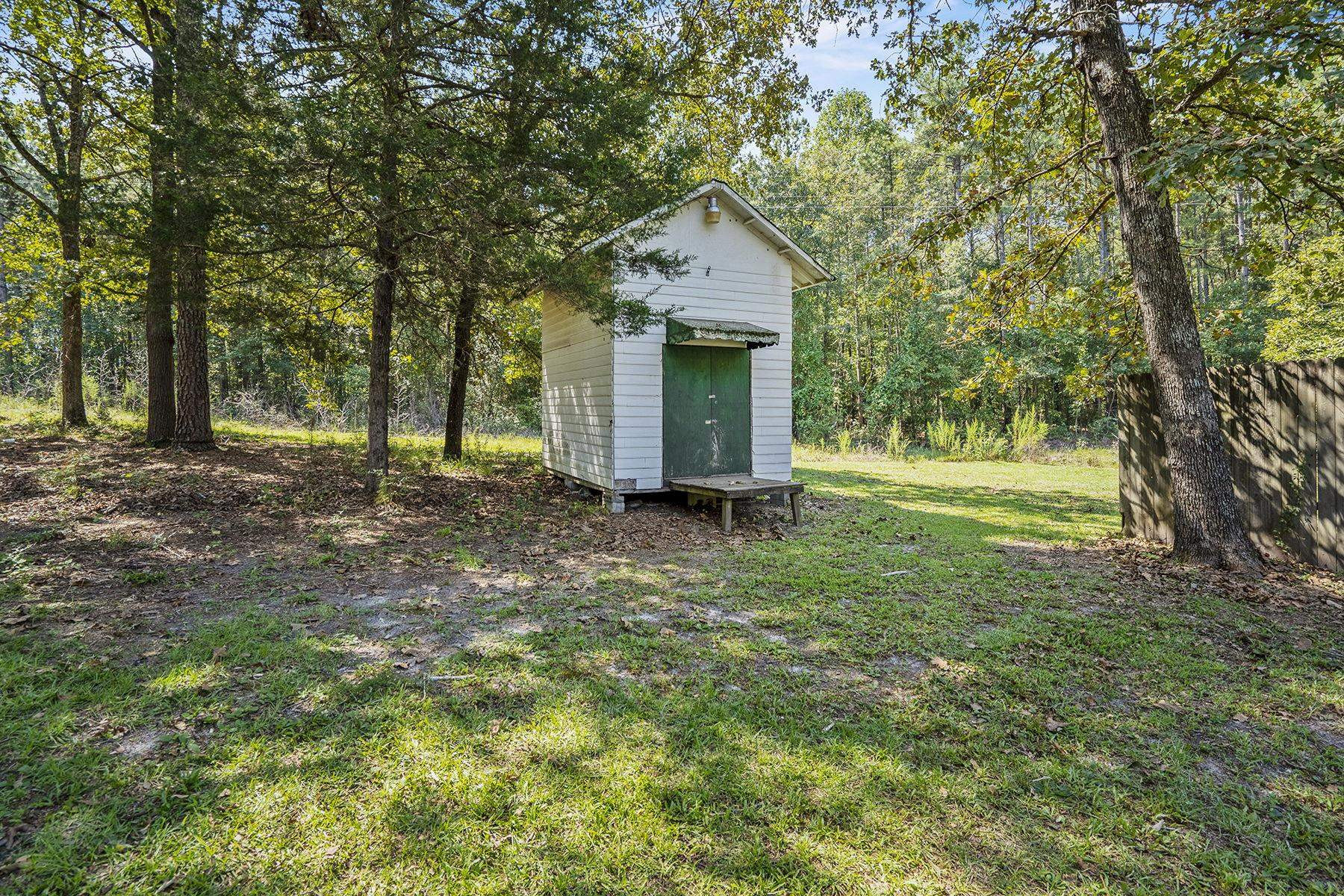 170 Temple Road Bunnlevel, NC 28323 - Photo 26 of 34 a front view of a house with a yard