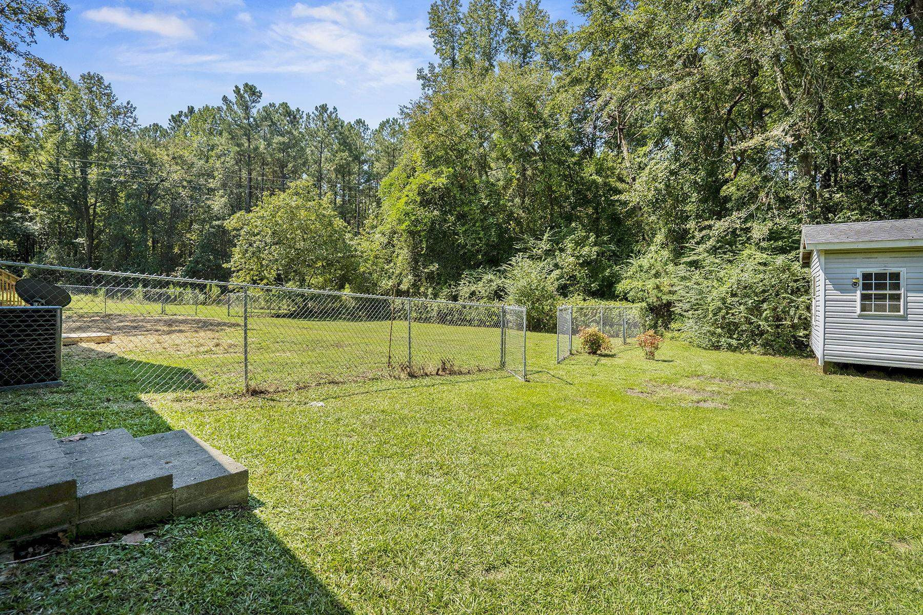 170 Temple Road Bunnlevel, NC 28323 - Photo 28 of 34 a view of a backyard with swimming pool