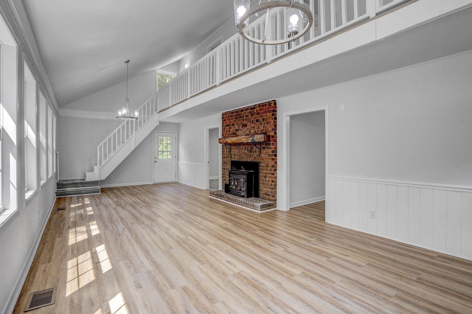 170 Temple Road Bunnlevel, NC 28323 - Photo 5 of 34 a view of an empty room and fire place