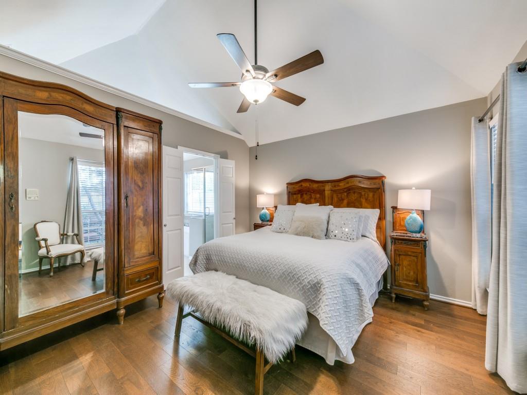 10805 Stone Canyon Road Dallas, TX 75230 - Photo 11 of 19 a bedroom with a bed and window