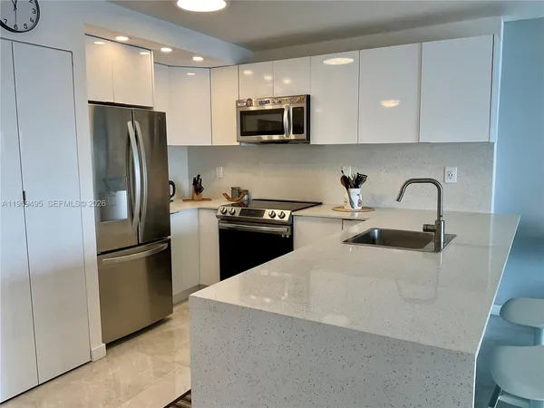 a bathroom with a shower and toilet