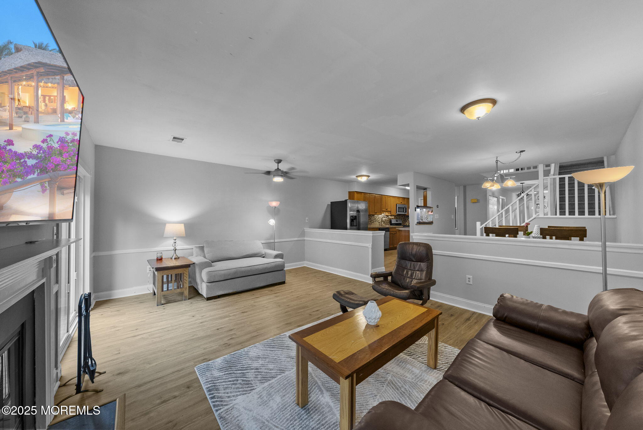 74 Lexington Circle Matawan, NJ 07747 - Photo 15 of 48 a living room with furniture and a flat screen tv