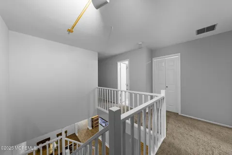 a view of an entryway with staircase