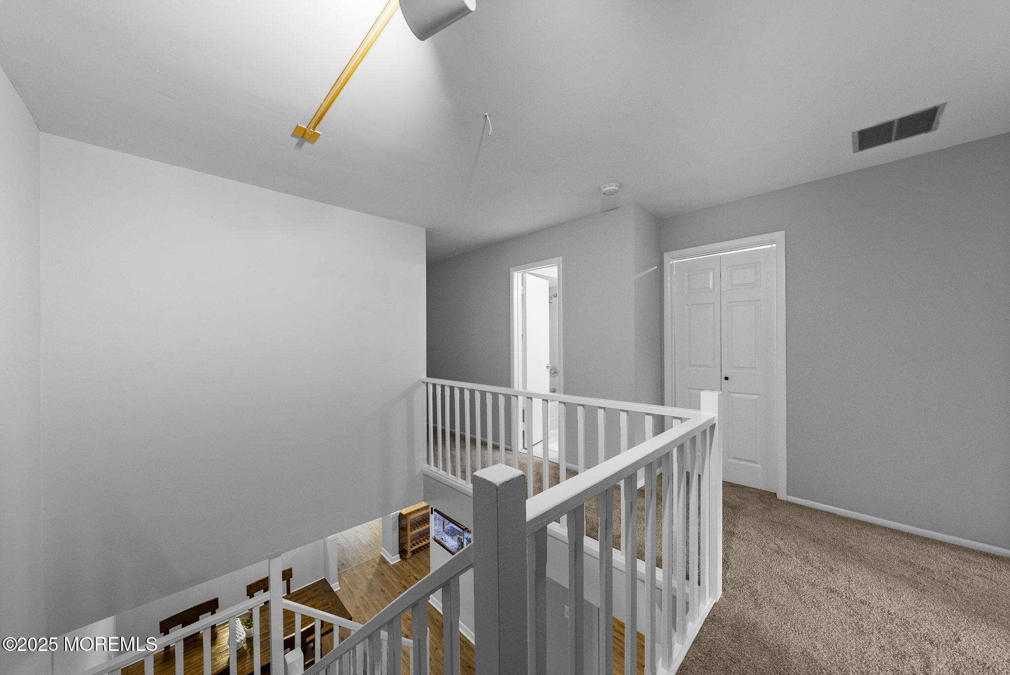 74 Lexington Circle Matawan, NJ 07747 - Photo 23 of 48 a view of an entryway with staircase