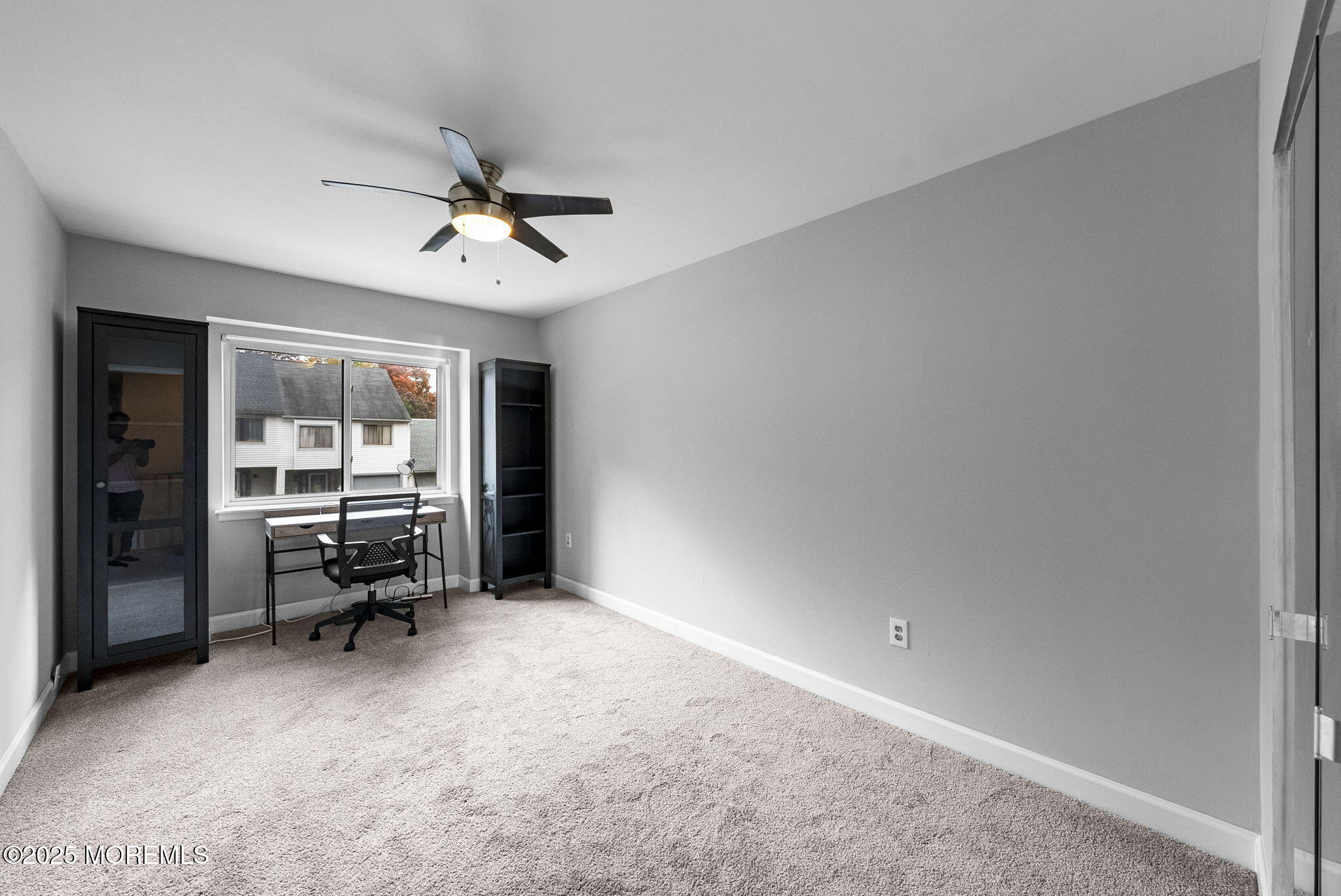 74 Lexington Circle Matawan, NJ 07747 - Photo 25 of 48 a view of a livingroom with furniture and a window