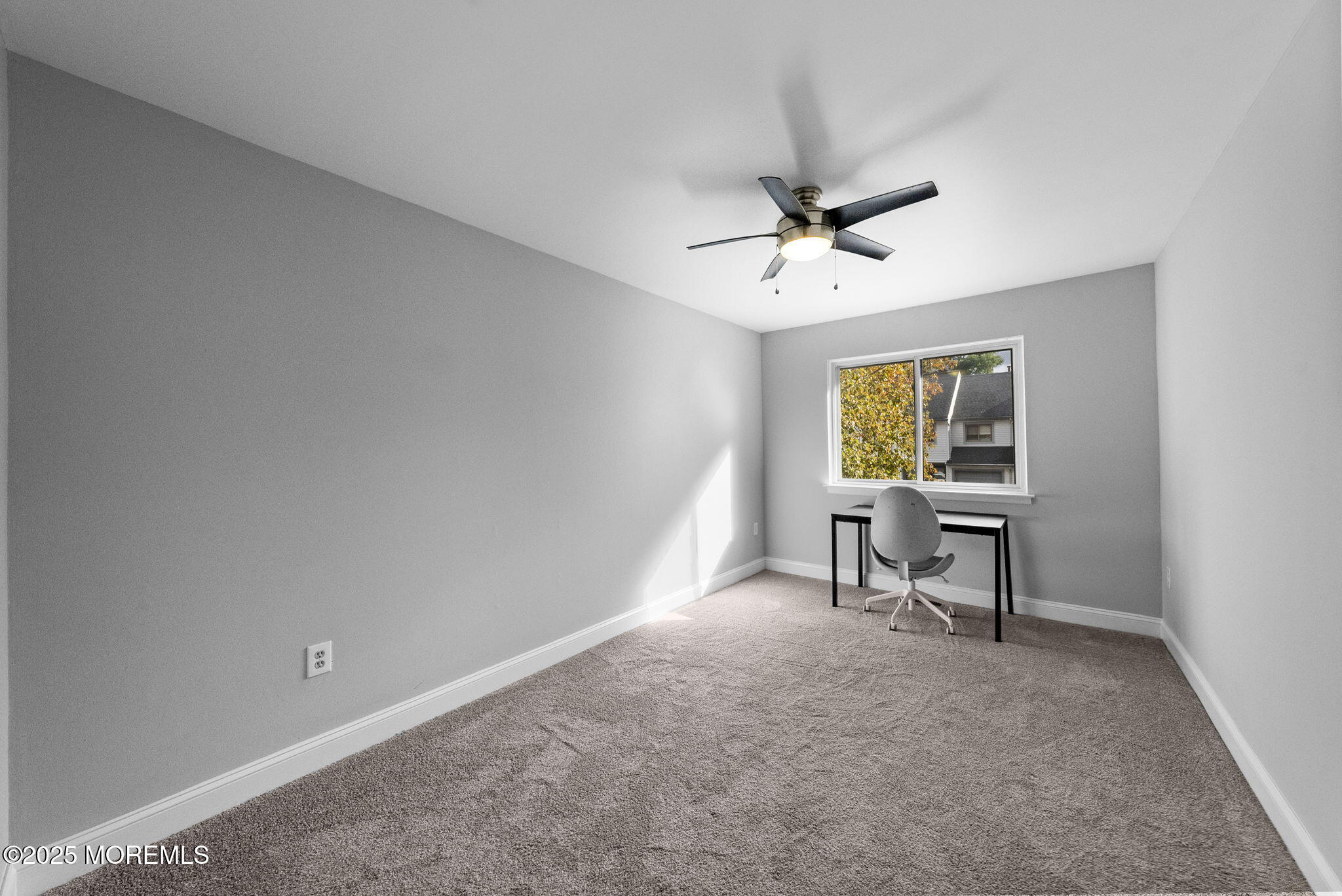 74 Lexington Circle Matawan, NJ 07747 - Photo 28 of 48 a view of a workspace with furniture and a window