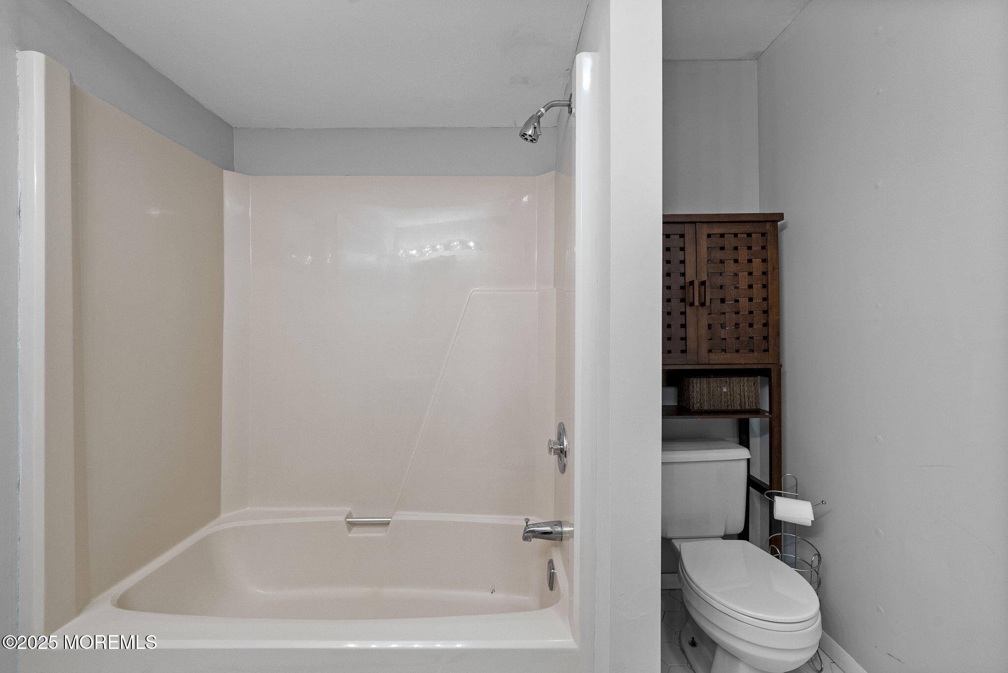 74 Lexington Circle Matawan, NJ 07747 - Photo 31 of 48 a white toilet sitting next to a bathroom sink