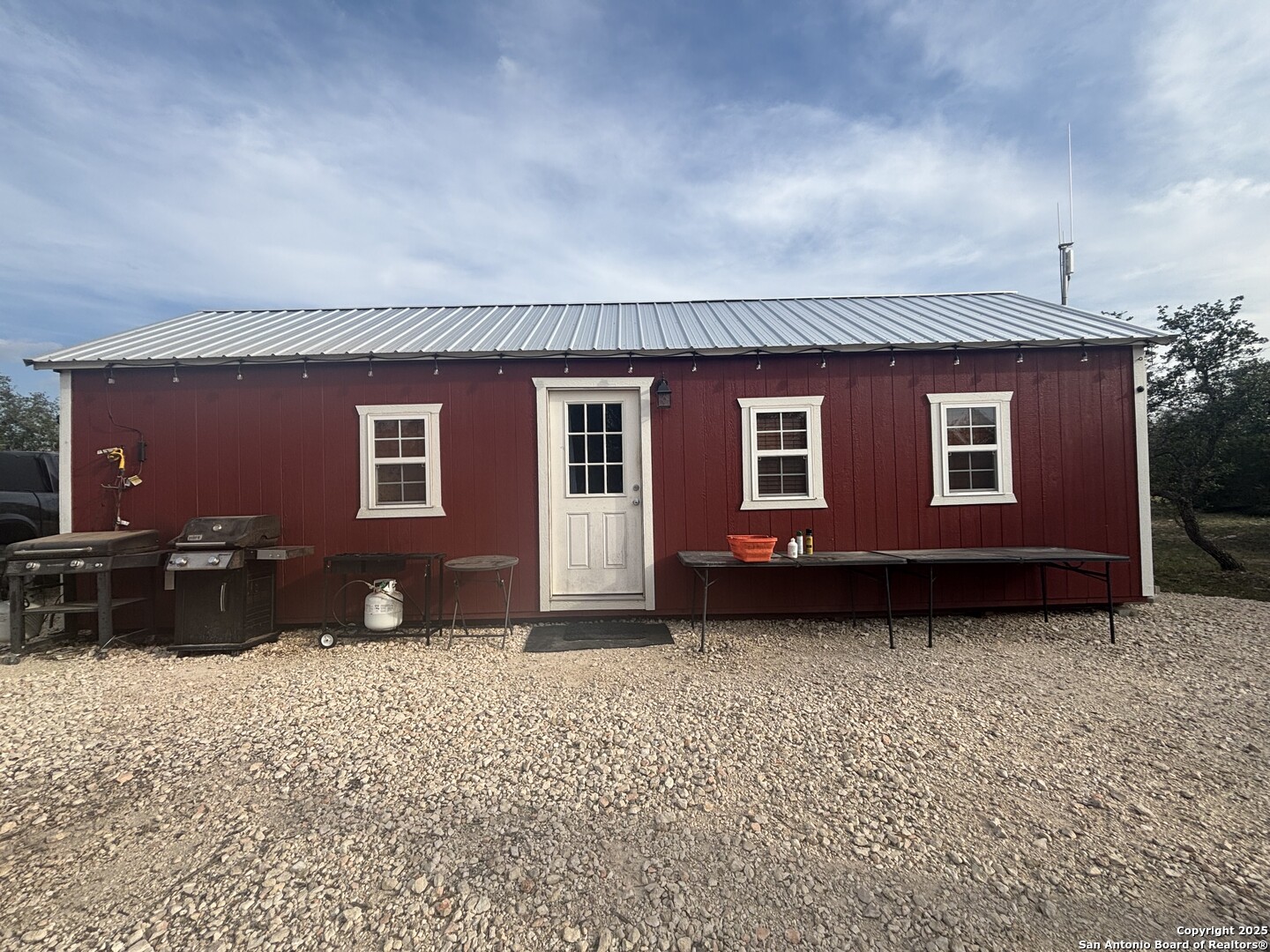1085 Fallow Road Christoval, TX 76935 - Photo 9 of 26 a backyard of a house with yard fire pit and outdoor seating