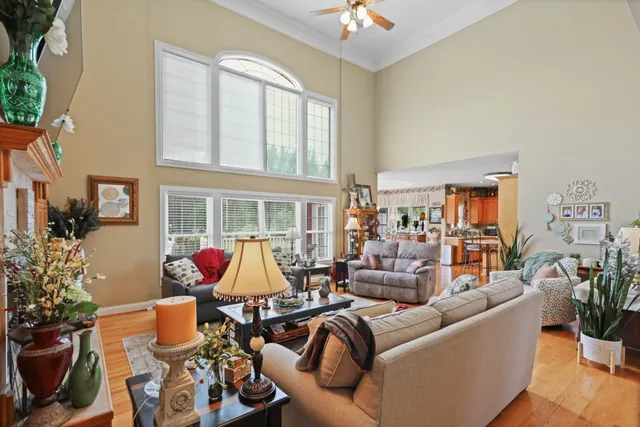 a kitchen with stainless steel appliances kitchen island granite countertop a sink and cabinets