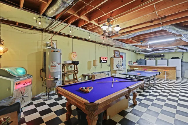 an aerial view of a house with a swimming pool