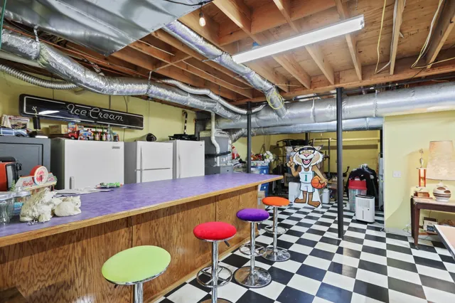a view of a tables and chairs in patio