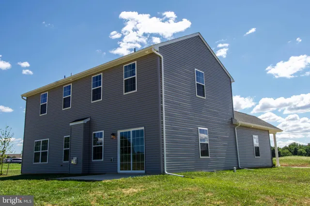 a front view of a house with a porch