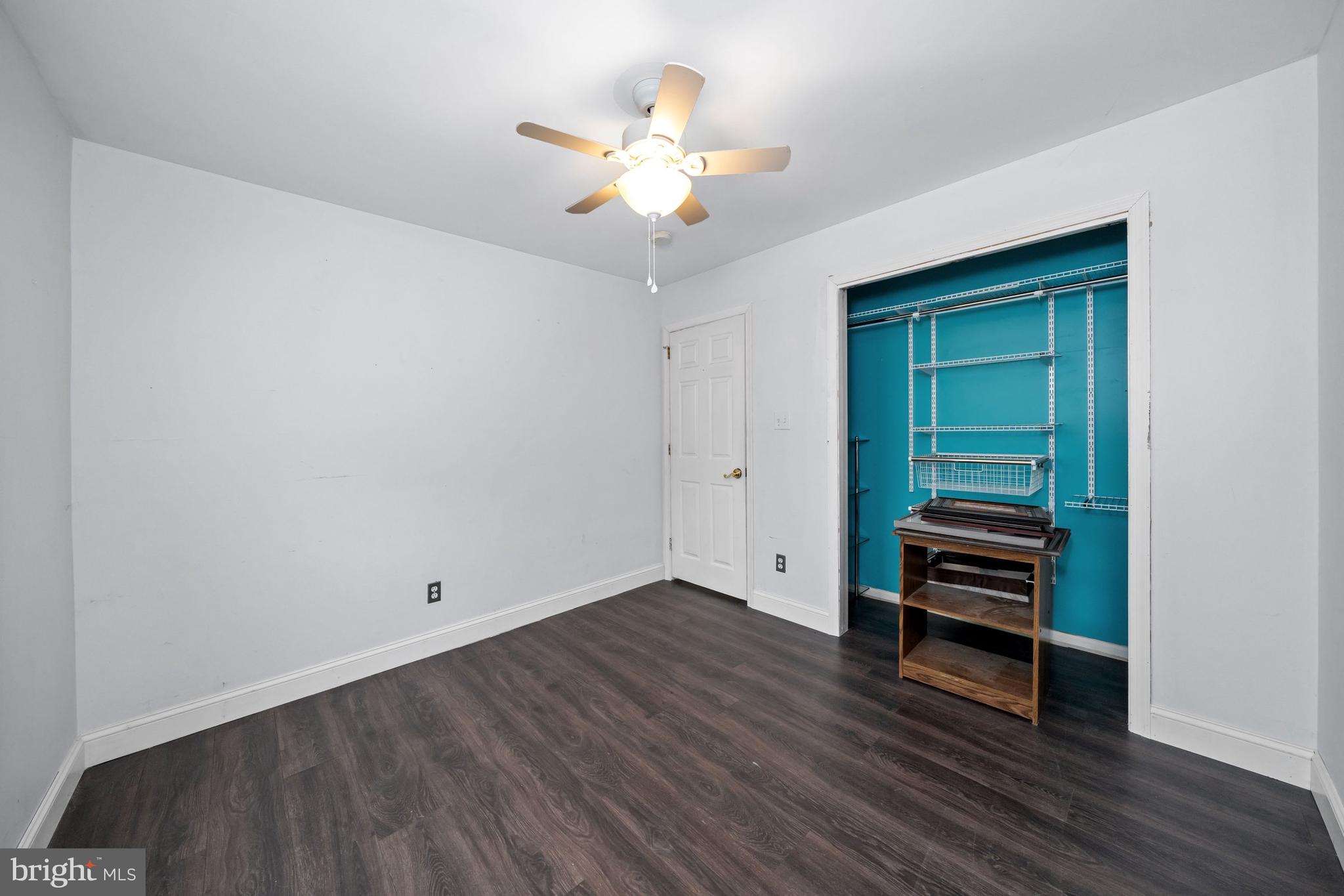 1023 Old Telegraph Road Warwick, MD 21912 - Photo 16 of 20 wooden floor in an empty room with a window