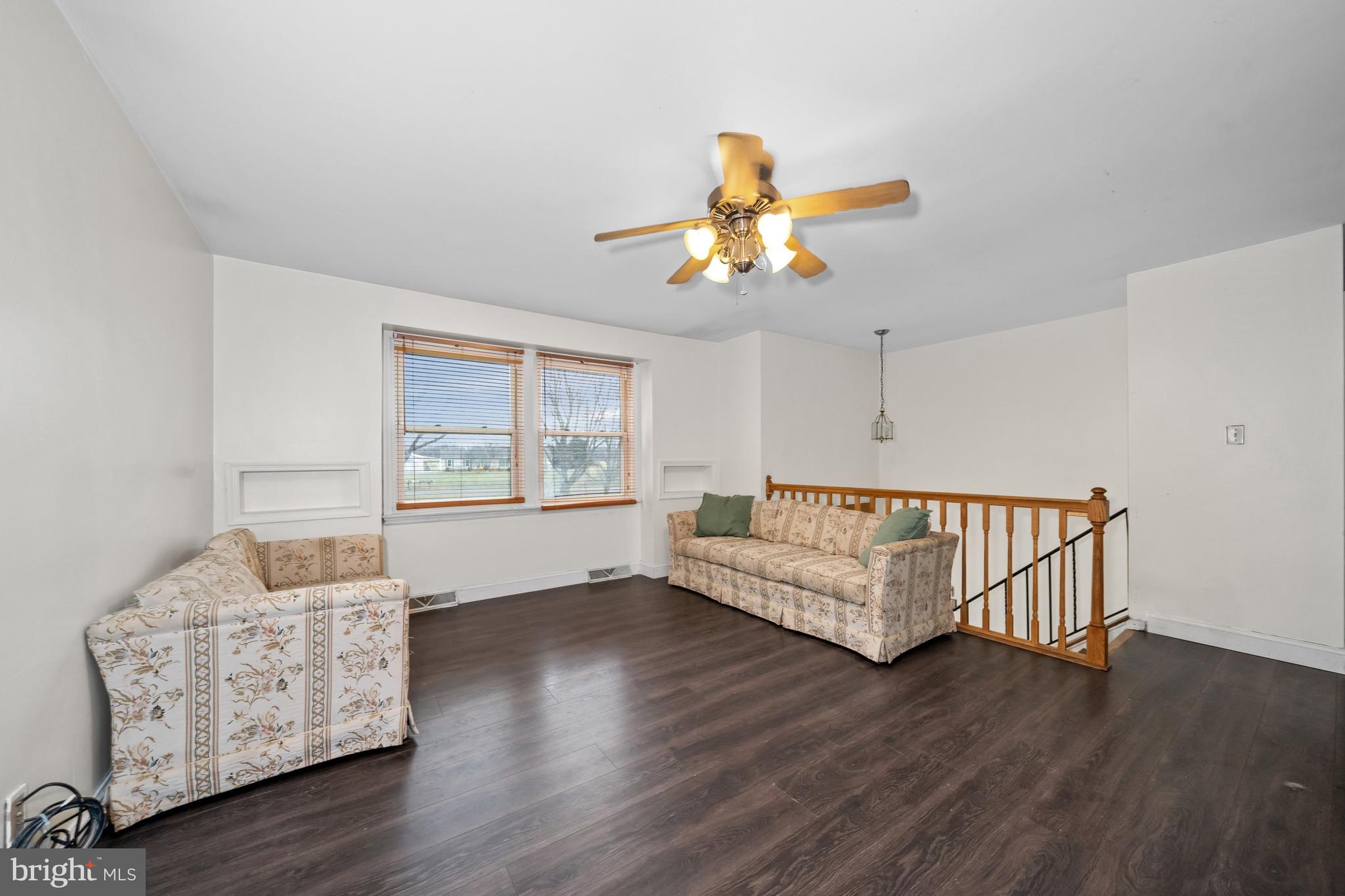 1023 Old Telegraph Road Warwick, MD 21912 - Photo 6 of 20 a view of an empty room with window and wooden floor