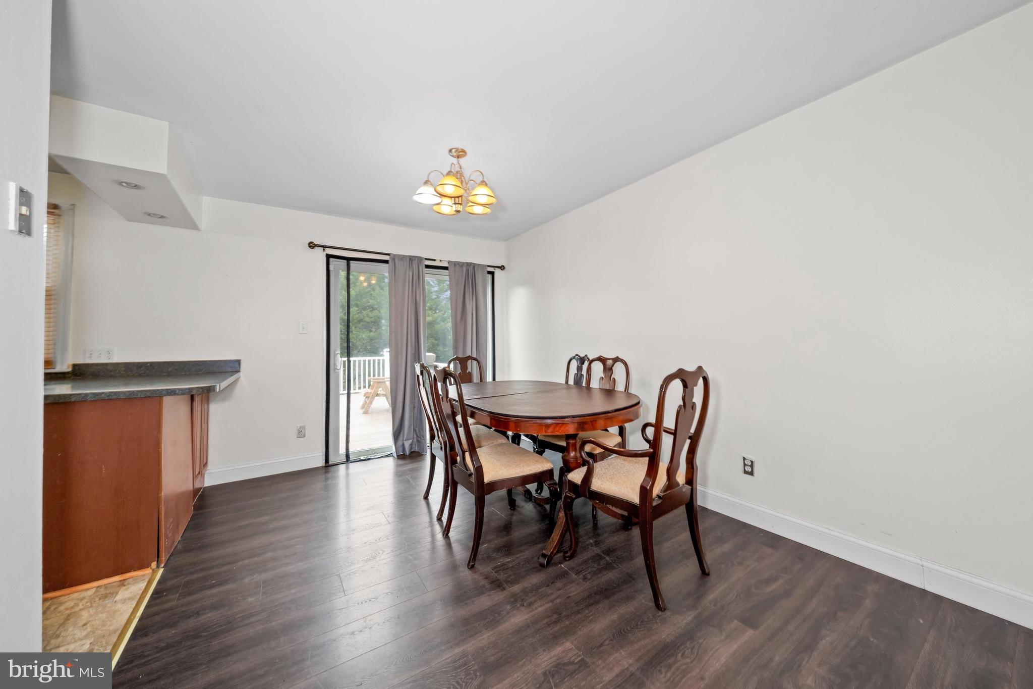 1023 Old Telegraph Road Warwick, MD 21912 - Photo 7 of 20 a view of a dining room with furniture and wooden floor