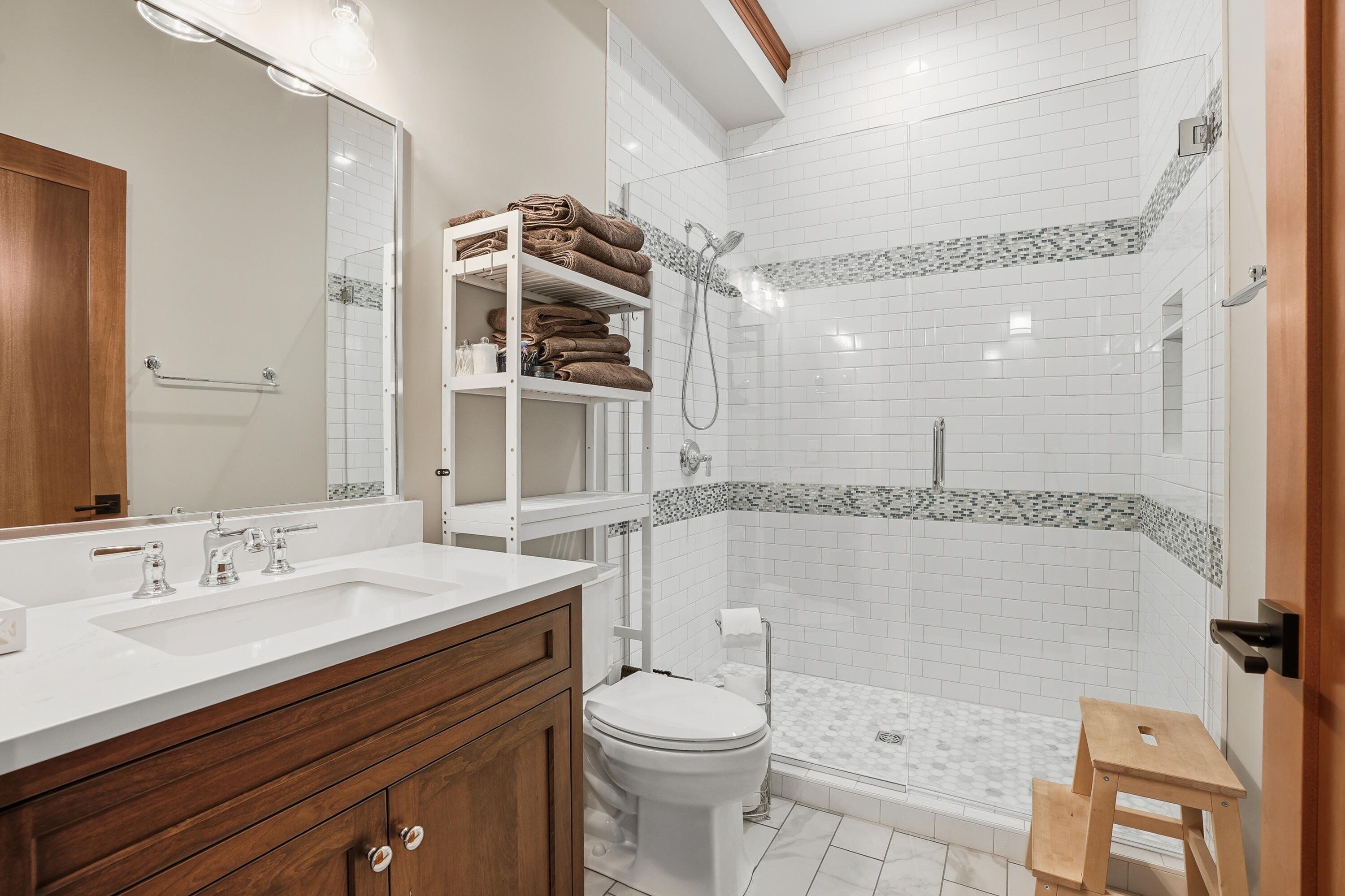 804 Shannon Drive Crown Point, IN 46307 - Photo 35 of 79 a bathroom with a sink a toilet a mirror and shower