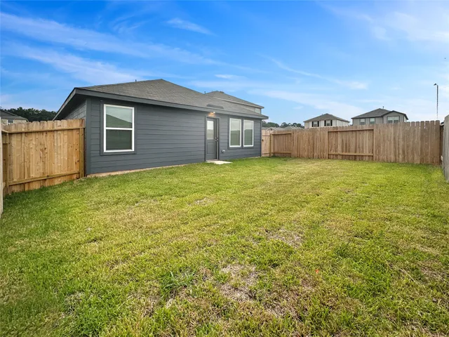 a house view with a garden space
