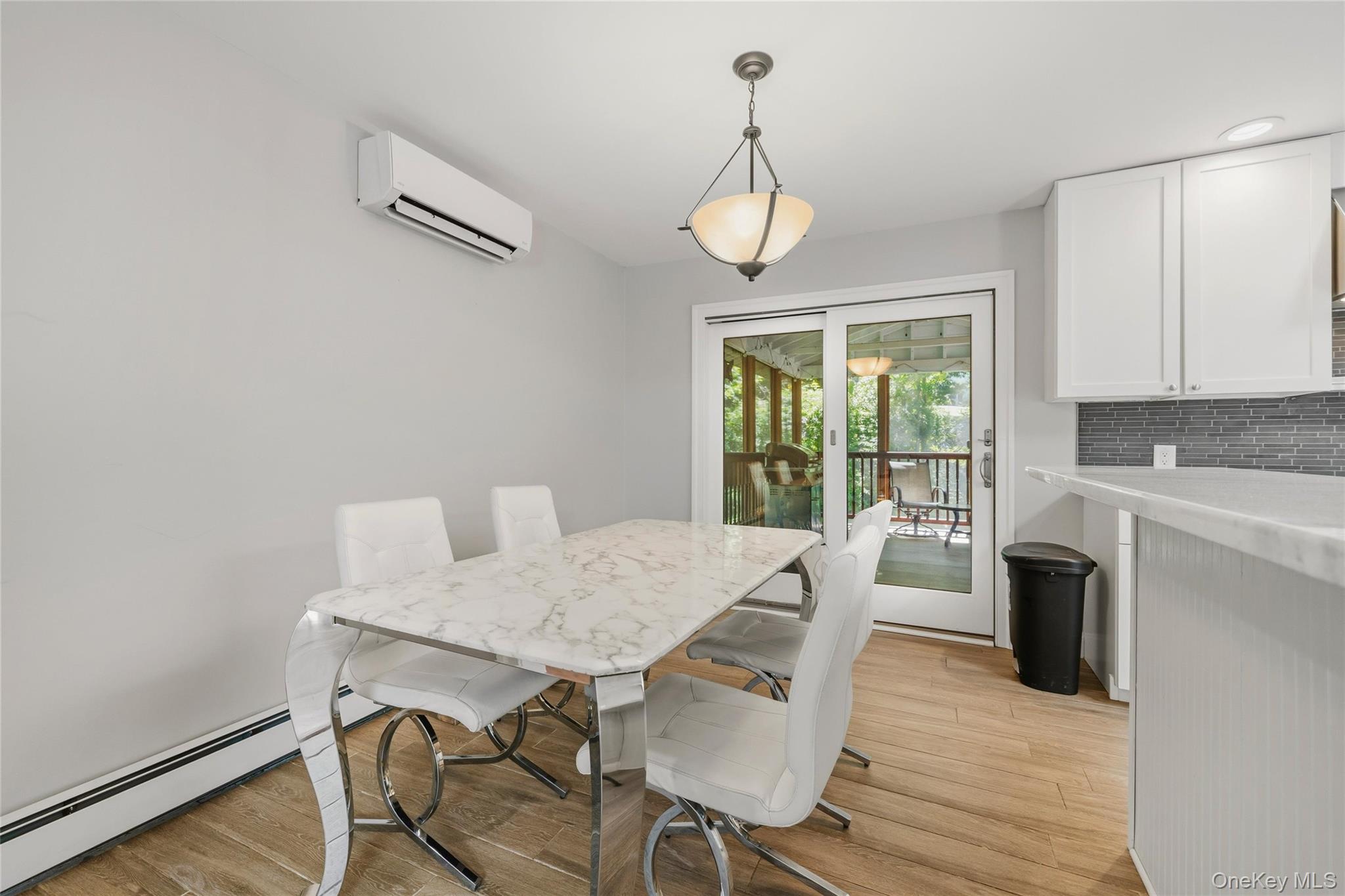 44 Sayer Road Blooming Grove, NY 10914 - Photo 7 of 39 a view of a dining room with furniture window and wooden floor