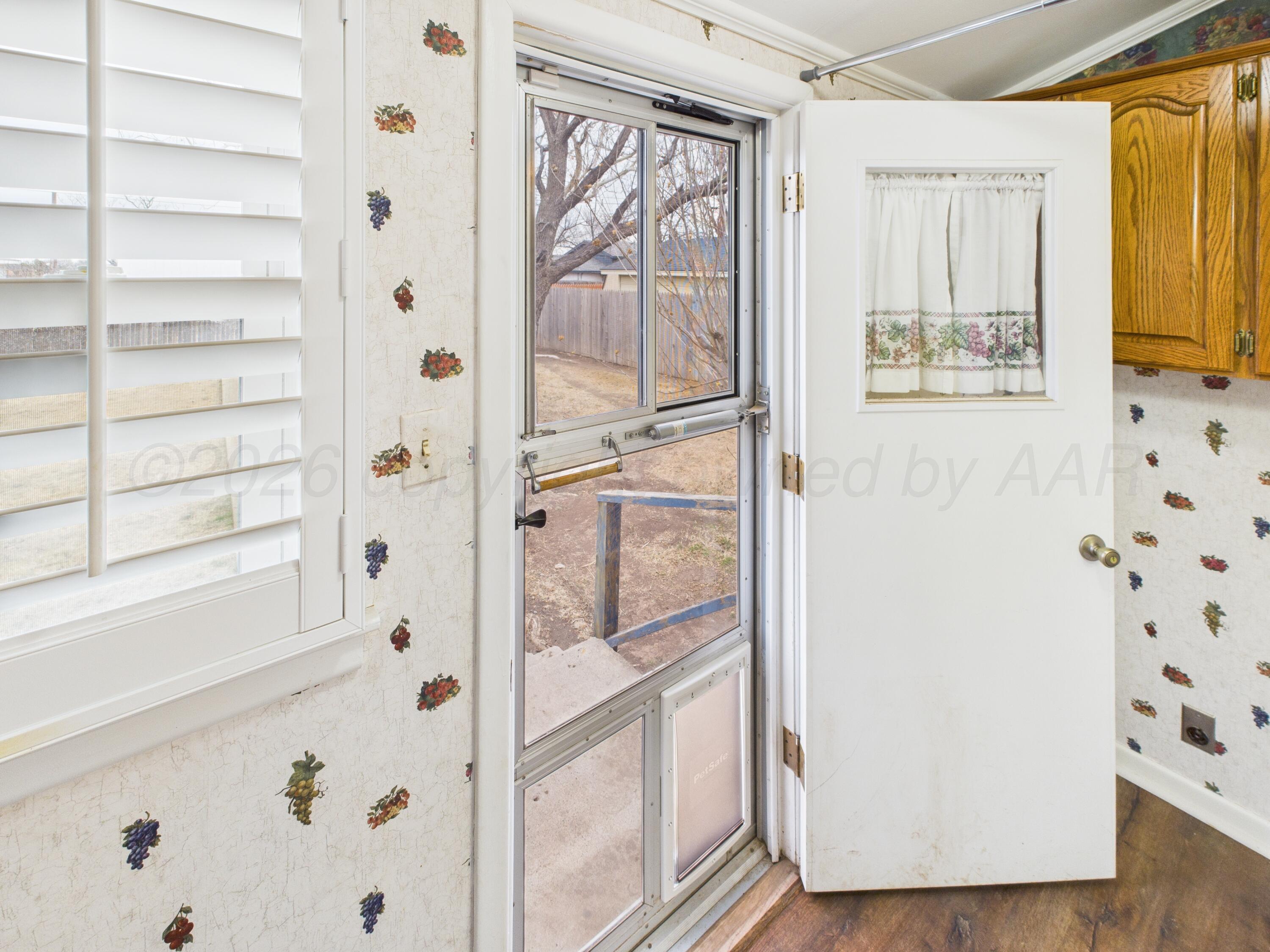 528 North Red Deer Street Pampa, TX 79065 - Photo 15 of 41 a view of a bathroom with a door