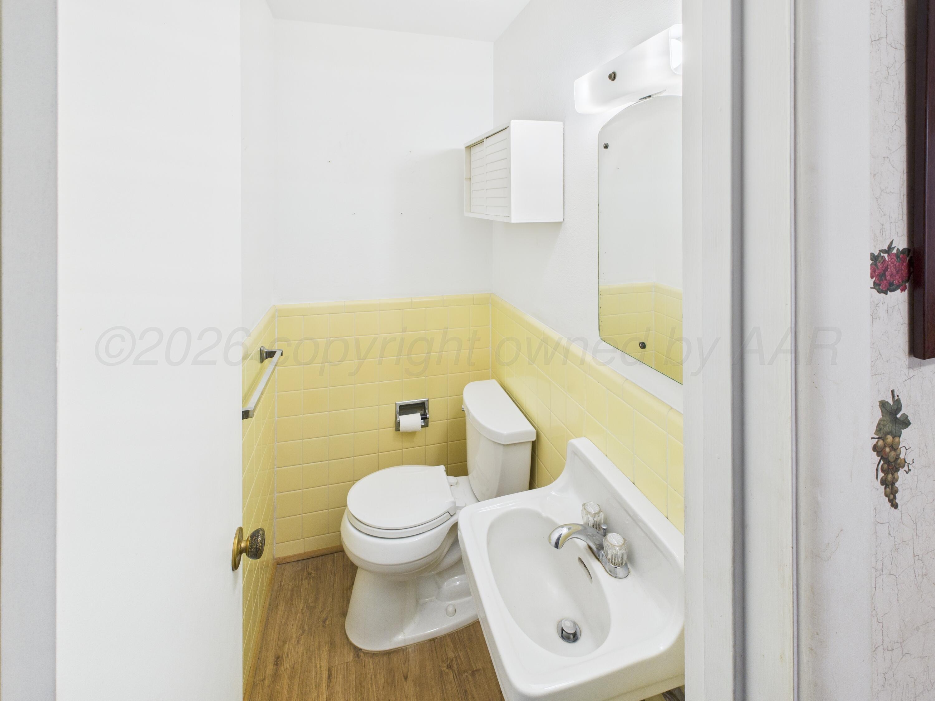 528 North Red Deer Street Pampa, TX 79065 - Photo 23 of 41 a bathroom with a sink and a toilet