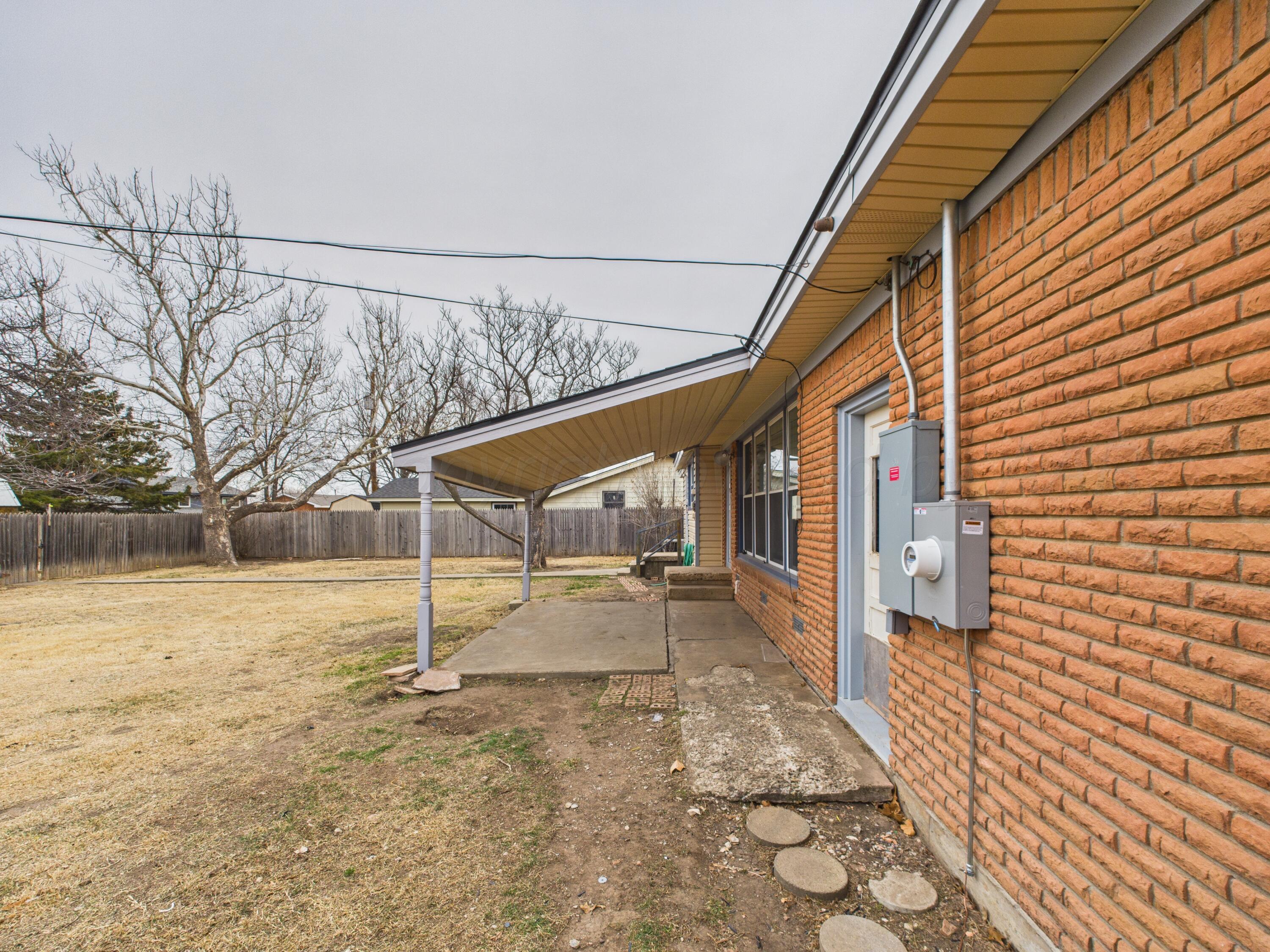528 North Red Deer Street Pampa, TX 79065 - Photo 39 of 41 a view of a house with a yard