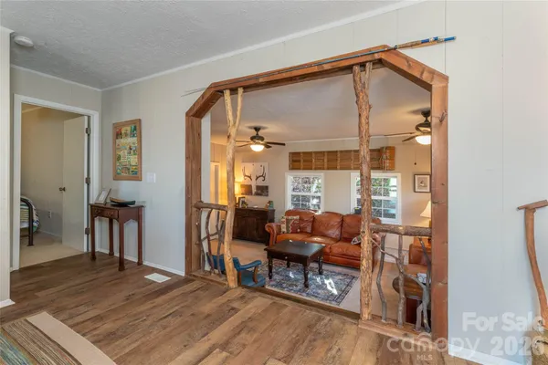 a livingroom with furniture and a table