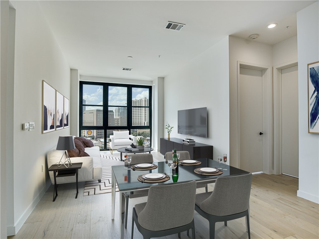 a living room with furniture and a window